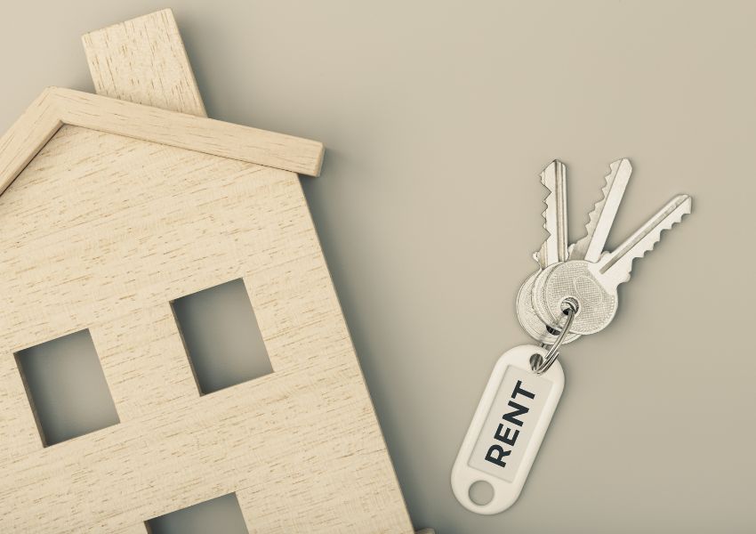 keys-and-wooden-house-cutout